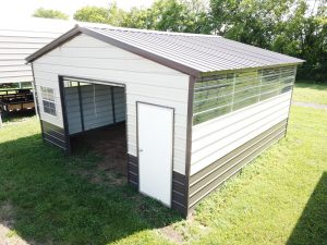 Metal workshop shed with clear panels